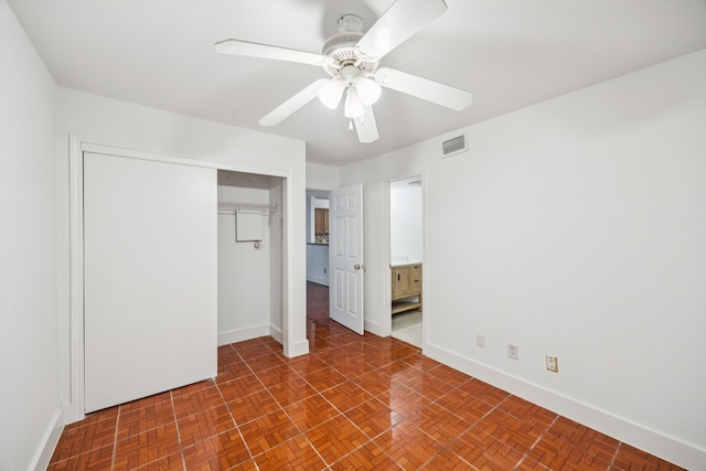 6108 Abrams Rd Unit 410, Dallas, TX 75231 - unfurnished bedroom featuring a closet, a ceiling fan, and ensuite bathroom