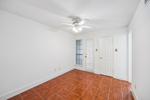 6108 Abrams Rd Unit 410, Dallas, TX 75231 - spare room featuring ceiling fan and baseboards