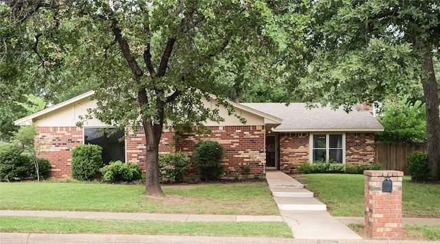 3501 Pecan Cir, Bedford, TX 76021 - view of front of property with brick siding and roof with shingles