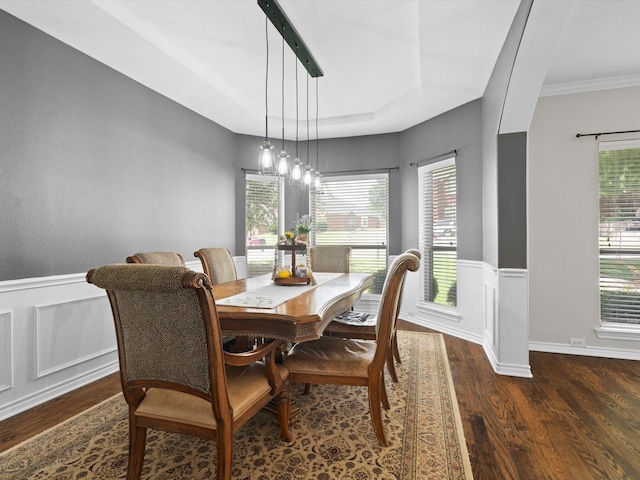 5503 Midnight Moon Dr, Frisco, TX 75036 - dining room featuring wood finished floors, wainscoting, healthy amount of natural light, and crown molding
