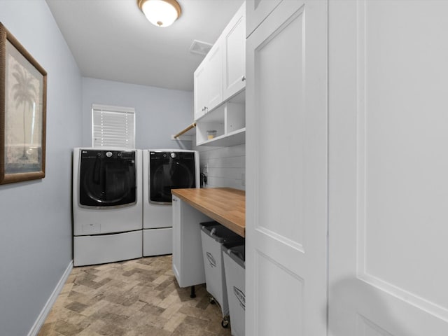 5503 Midnight Moon Dr, Frisco, TX 75036 - washroom with washer and dryer and cabinet space