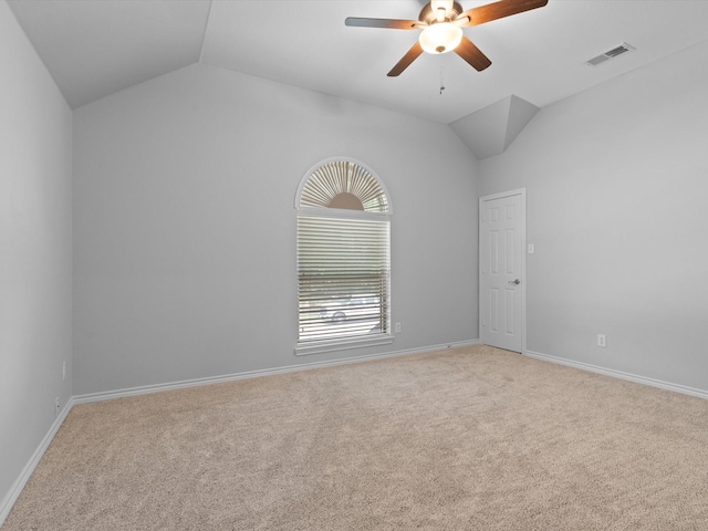 5503 Midnight Moon Dr, Frisco, TX 75036 - unfurnished room featuring light colored carpet, vaulted ceiling, and ceiling fan