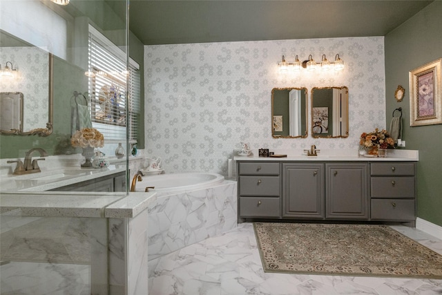 2604 Gavin Dr, Mansfield, TX 76063 - bathroom featuring marble look tile flooring, two vanities, and a bath