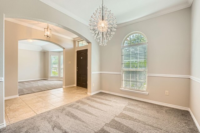 1119 Leafy Glade Rd, Forney, TX 75126 - spare room with carpet floors, arched walkways, a chandelier, crown molding, and tile patterned floors