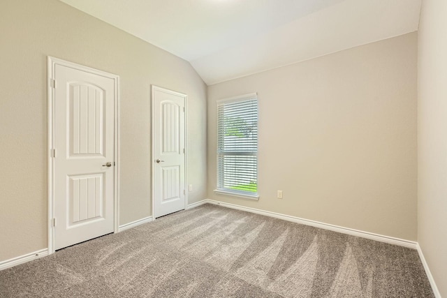 1119 Leafy Glade Rd, Forney, TX 75126 - unfurnished bedroom featuring carpet floors and vaulted ceiling
