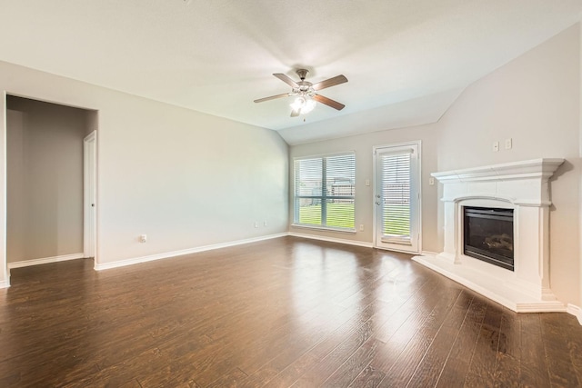 1119 Leafy Glade Rd, Forney, TX 75126 - unfurnished living room with ceiling fan, a glass covered fireplace, dark wood finished floors, and vaulted ceiling