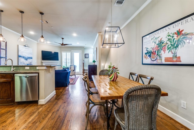 7333 Valley View Ln Unit 304, Dallas, TX 75240 - dining space featuring crown molding, wood finished floors, ceiling fan, and recessed lighting