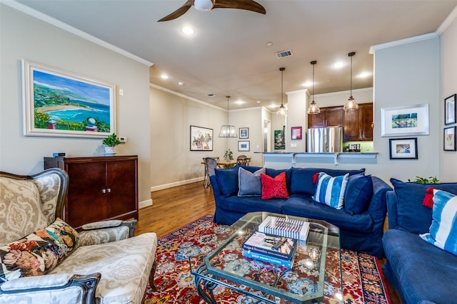 7333 Valley View Ln Unit 304, Dallas, TX 75240 - living room with a ceiling fan, ornamental molding, recessed lighting, and wood finished floors