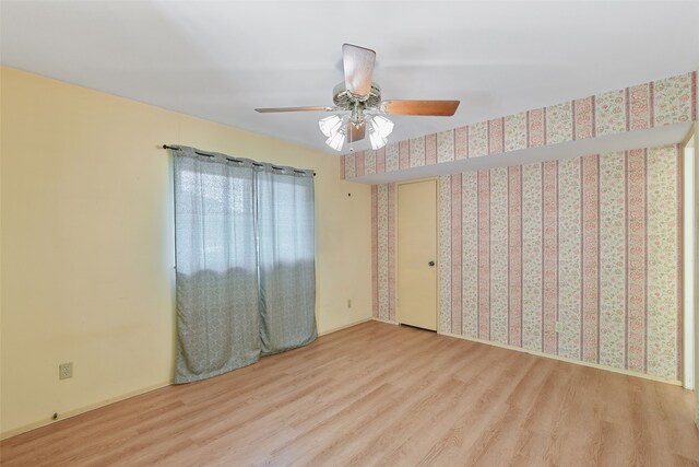921 Sleepy Hollow Dr, Garland, TX 75043 - unfurnished room featuring wood finished floors and ceiling fan