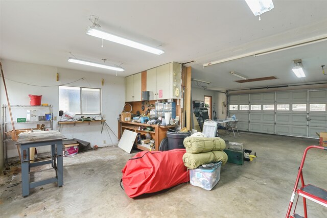 921 Sleepy Hollow Dr, Garland, TX 75043 - garage featuring a workshop area