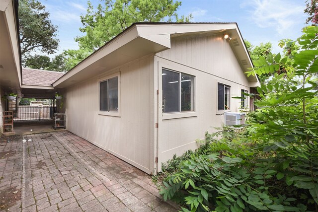 921 Sleepy Hollow Dr, Garland, TX 75043 - view of home's exterior with a patio area