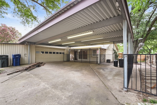 921 Sleepy Hollow Dr, Garland, TX 75043 - garage with driveway and a gate
