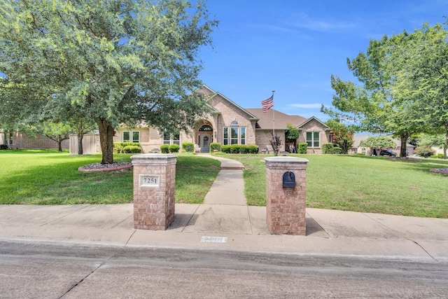 7251 Misty Glen Ln, Midlothian, TX 76065 - view of front of home with a front lawn