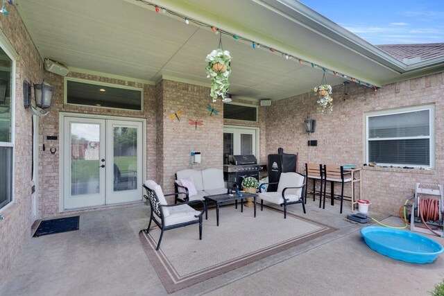 7251 Misty Glen Ln, Midlothian, TX 76065 - view of patio with french doors, area for grilling, and outdoor lounge area