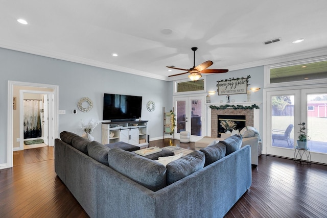 7251 Misty Glen Ln, Midlothian, TX 76065 - living room with french doors, ceiling fan, dark wood finished floors, recessed lighting, and ornamental molding