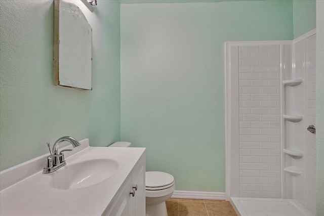 1611 Glen Ave, Dallas, TX 75216 - full bathroom featuring a tile shower, tile patterned floors, and vanity