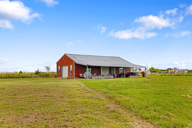 2210 N Sky Meadows Dr, Caddo Mills, TX 75135 - view of pole building with a lawn
