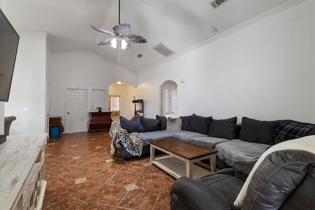 2210 N Sky Meadows Dr, Caddo Mills, TX 75135 - living room with arched walkways, ceiling fan, ornamental molding, high vaulted ceiling, and dark tile patterned floors