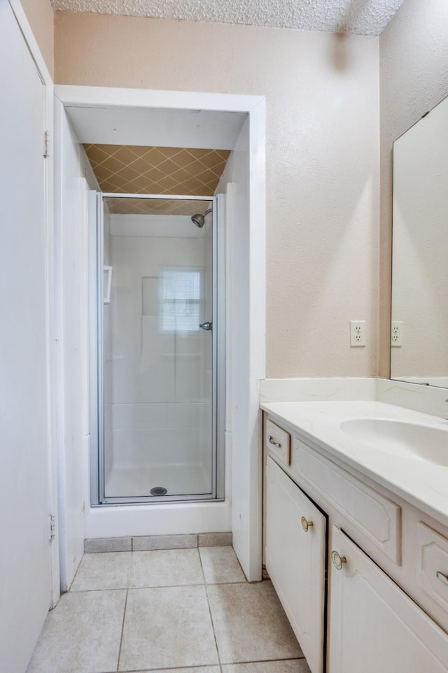 6221 Onyx Dr N, North Richland Hills, TX 76180 - full bathroom with vanity, a shower stall, and tile patterned flooring