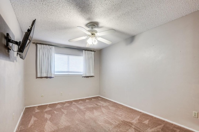 6221 Onyx Dr N, North Richland Hills, TX 76180 - empty room featuring a ceiling fan, carpet floors, and a textured ceiling
