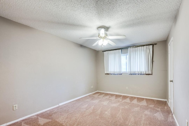6221 Onyx Dr N, North Richland Hills, TX 76180 - empty room with a ceiling fan, light carpet, and a textured ceiling