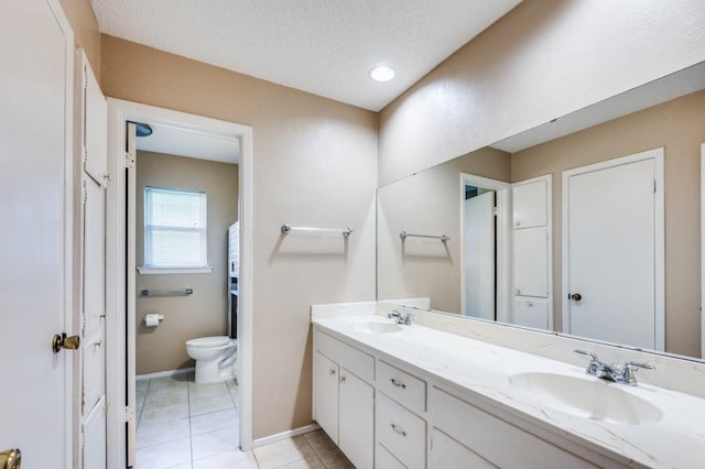 6221 Onyx Dr N, North Richland Hills, TX 76180 - bathroom featuring double vanity, tile patterned floors, and a textured ceiling