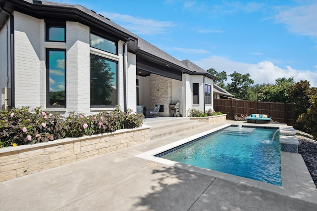 8305 Caballo Dr, North Richland Hills, TX 76182 - view of swimming pool featuring a patio, a fenced backyard, and outdoor lounge area
