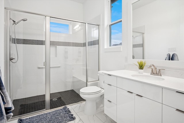 8305 Caballo Dr, North Richland Hills, TX 76182 - bathroom featuring marble finish flooring, vanity, and a stall shower
