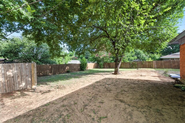 1037 Cavender Dr, Hurst, TX 76053 - view of fenced backyard