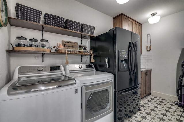 1509 Banbury Ct, Richardson, TX 75082 - laundry room featuring washing machine and clothes dryer and light flooring