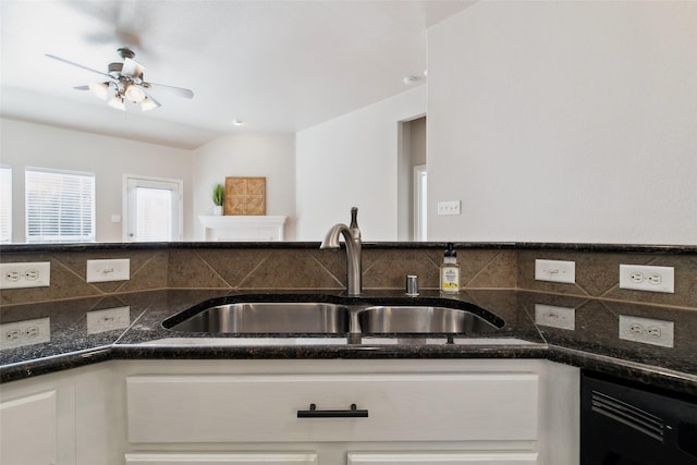 8648 Marion Dr, Frisco, TX 75036 - kitchen with ceiling fan, tasteful backsplash, and white cabinetry