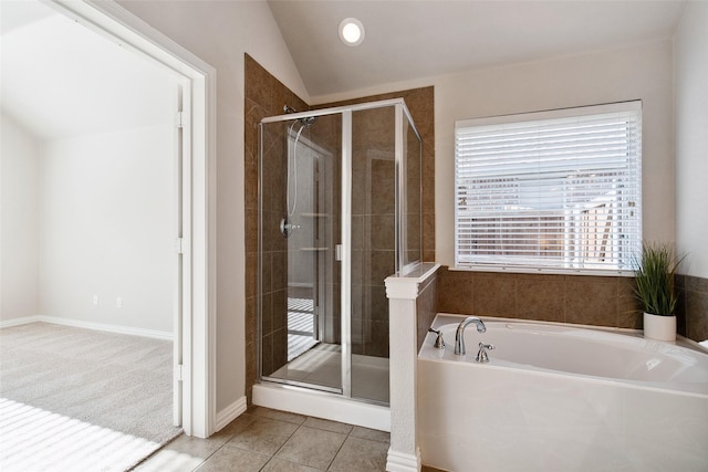 8648 Marion Dr, Frisco, TX 75036 - bathroom with a shower stall, a bath, tile patterned floors, lofted ceiling, and recessed lighting