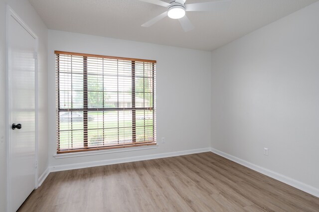 2508 Independence Dr, Mesquite, TX 75150 - empty room featuring light wood-style flooring and ceiling fan