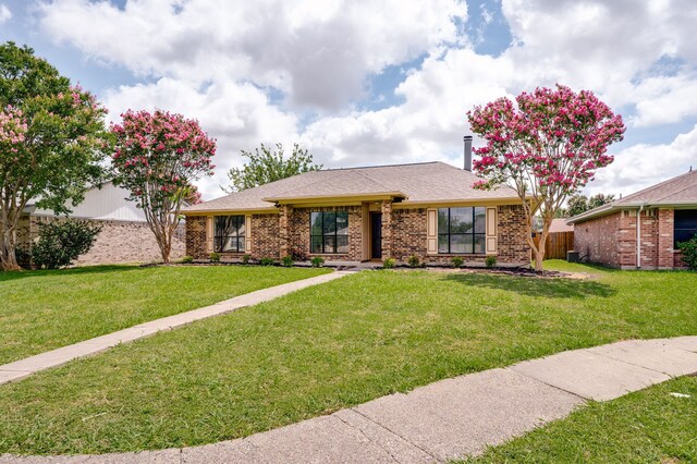 2508 Independence Dr, Mesquite, TX 75150 - view of front facade featuring brick siding and a shingled roof