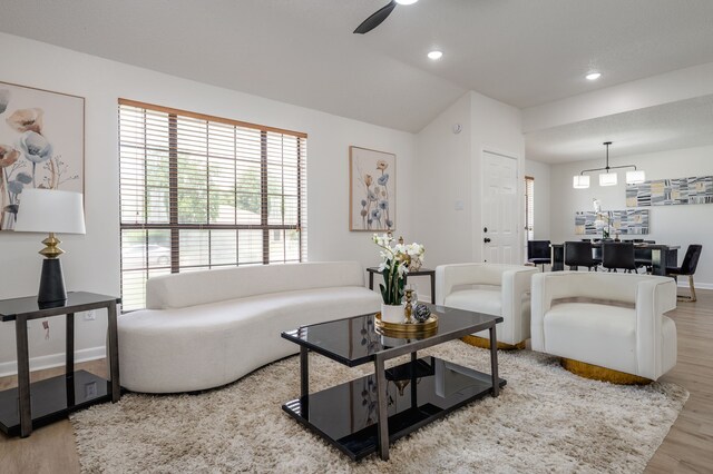 2508 Independence Dr, Mesquite, TX 75150 - living room featuring wood finished floors, vaulted ceiling, recessed lighting, and ceiling fan
