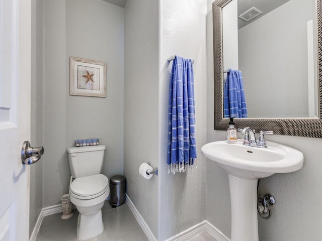 1314 Merrimac Dr, Allen, TX 75002 - half bath featuring toilet and tile patterned floors
