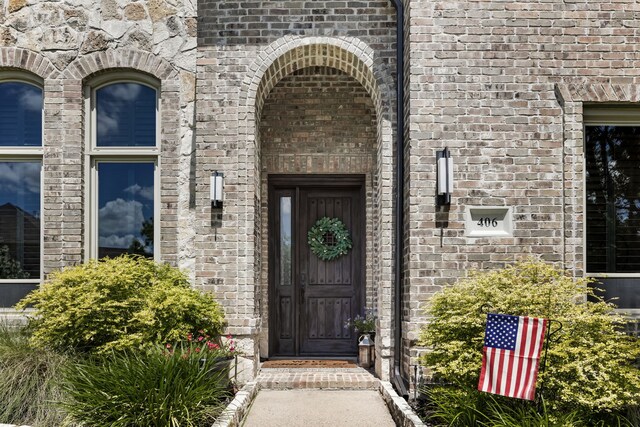 406 Old York Rd, Coppell, TX 75019 - property entrance featuring brick siding