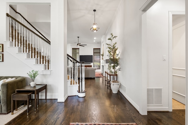 406 Old York Rd, Coppell, TX 75019 - foyer entrance with ceiling fan, stairs, and wood finished floors