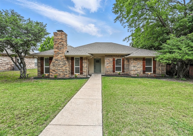3505 Scott Dr, Rowlett, TX 75088 - single story home featuring a front lawn, a chimney, and roof with shingles