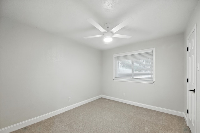 3505 Scott Dr, Rowlett, TX 75088 - unfurnished bedroom featuring light colored carpet and a ceiling fan