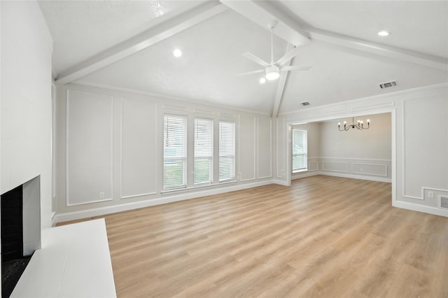 3505 Scott Dr, Rowlett, TX 75088 - unfurnished living room with a decorative wall, ceiling fan, a chandelier, a fireplace, and light wood-style flooring