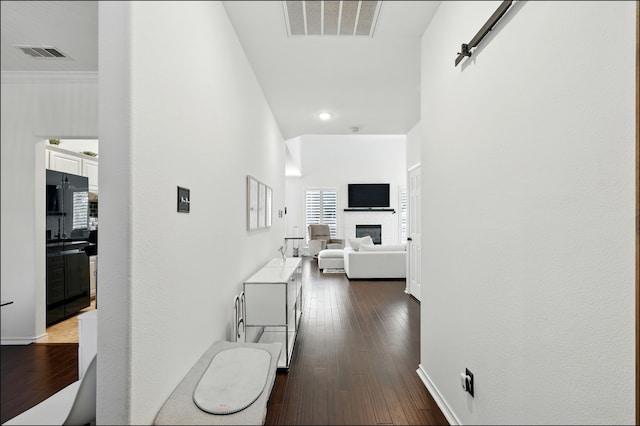 1604 Tree Line Rd, Flower Mound, TX 75028 - hallway with dark wood-type flooring and recessed lighting