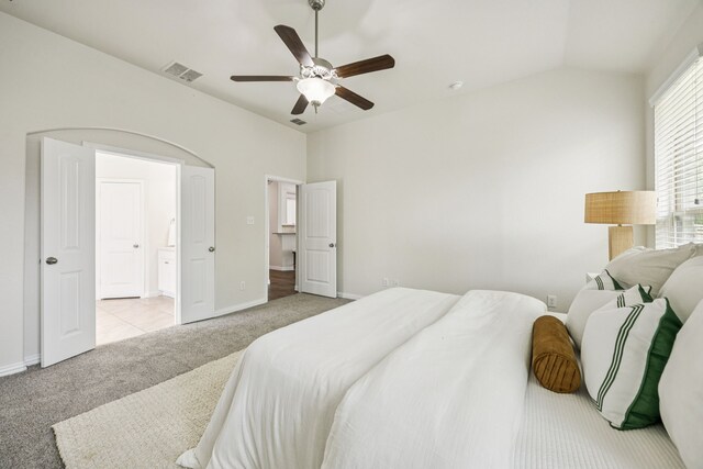 1012 Rising Moon Dr, Fort Worth, TX 76052 - bedroom featuring light carpet, vaulted ceiling, ensuite bathroom, and ceiling fan