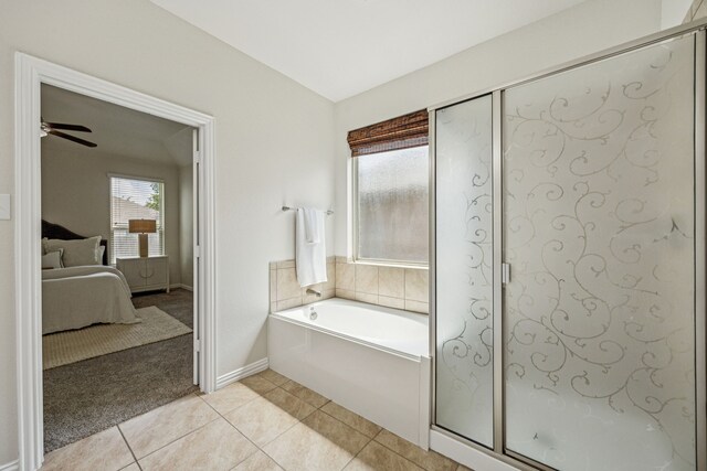 1012 Rising Moon Dr, Fort Worth, TX 76052 - bathroom featuring ensuite bathroom, a garden tub, plenty of natural light, and tile patterned floors