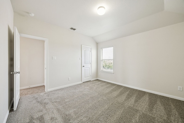 1012 Rising Moon Dr, Fort Worth, TX 76052 - unfurnished bedroom with carpet flooring and lofted ceiling