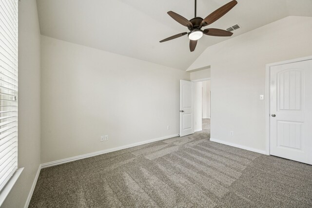 1012 Rising Moon Dr, Fort Worth, TX 76052 - unfurnished bedroom with vaulted ceiling, carpet, and a ceiling fan