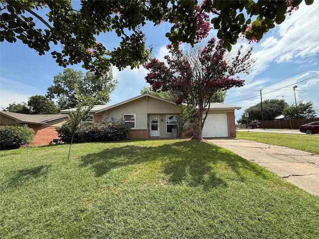 1747 Lucille Dr, Mesquite, TX 75149 - ranch-style house with brick siding, an attached garage, driveway, and a front lawn
