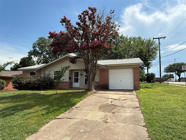 1747 Lucille Dr, Mesquite, TX 75149 - ranch-style house featuring brick siding, a garage, a front yard, and concrete driveway