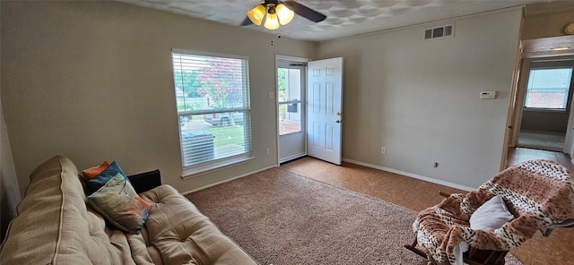 1747 Lucille Dr, Mesquite, TX 75149 - living room featuring ceiling fan and light carpet