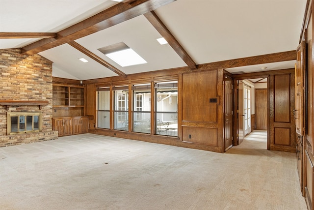 10009 Apple Creek Dr, Dallas, TX 75243 - unfurnished living room featuring light carpet, built in shelves, and wooden walls